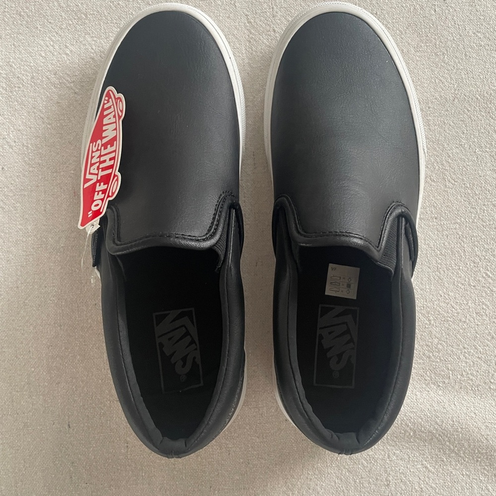Vans Women Black and White Faux Leather Slip-On Sneakers